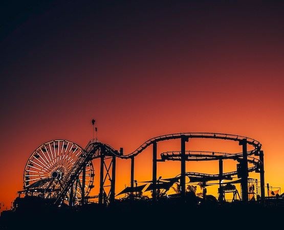 A roller coaster at sunset santa monica pier
